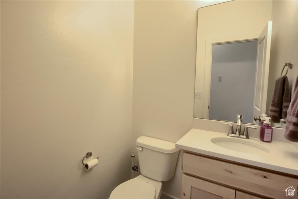 Bathroom with vanity and toilet