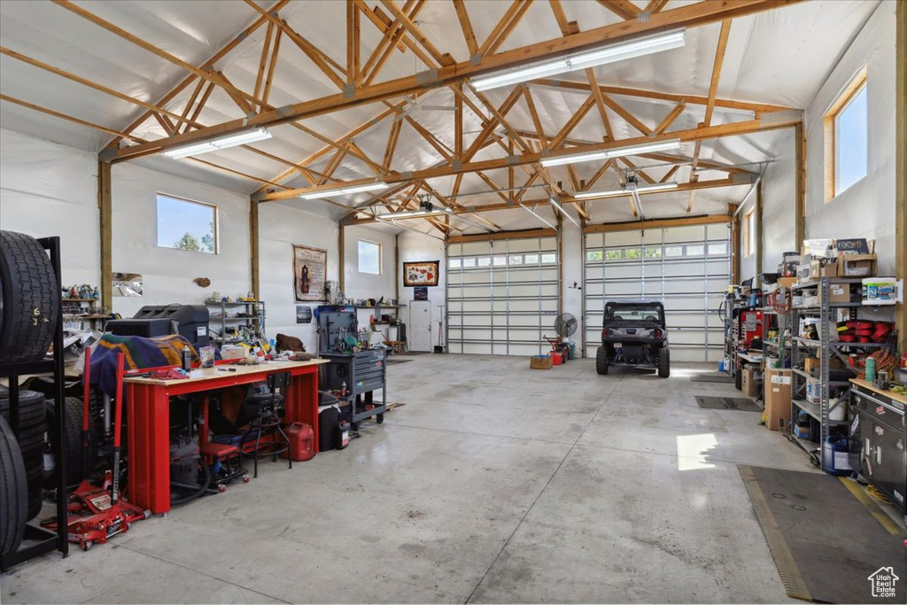 Garage featuring a workshop area