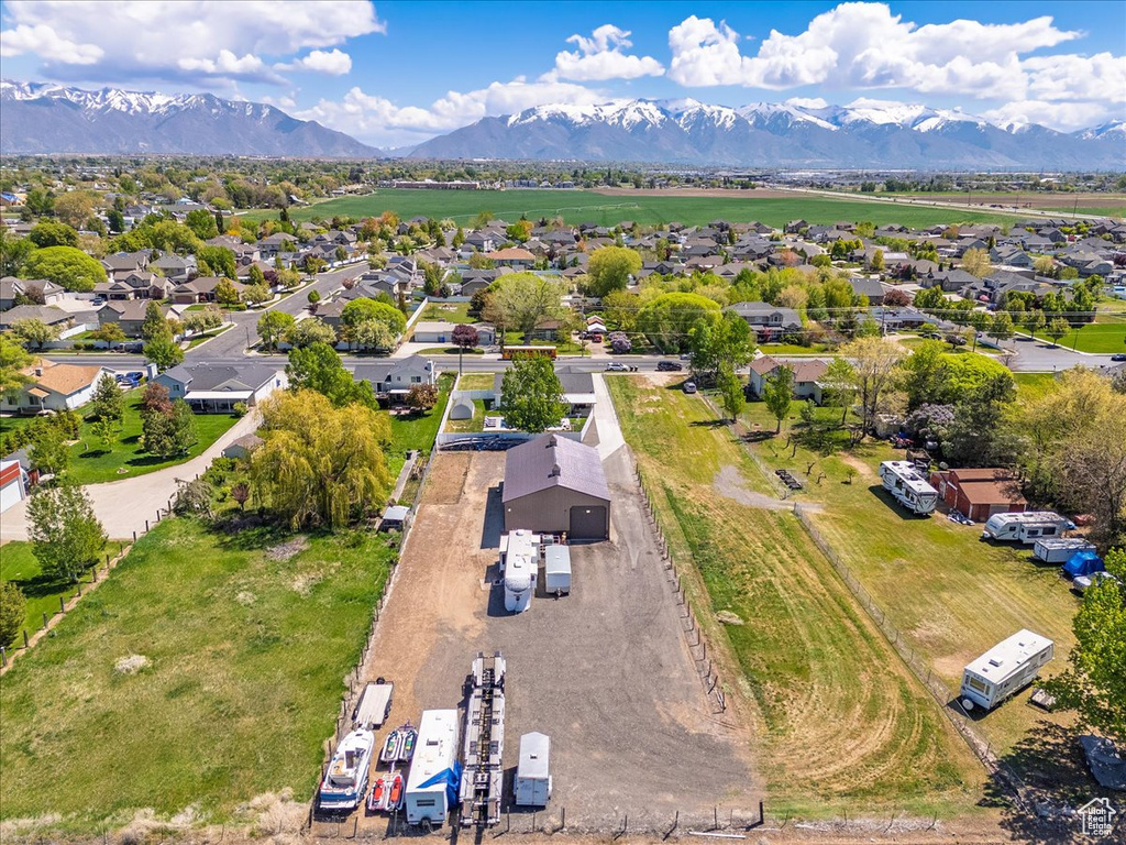Drone / aerial view featuring a residential view and a mountain view
