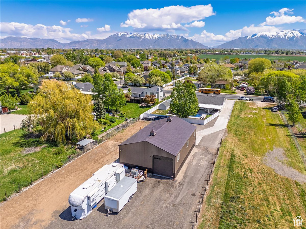 Birds eye view of property featuring a residential view and a mountain view
