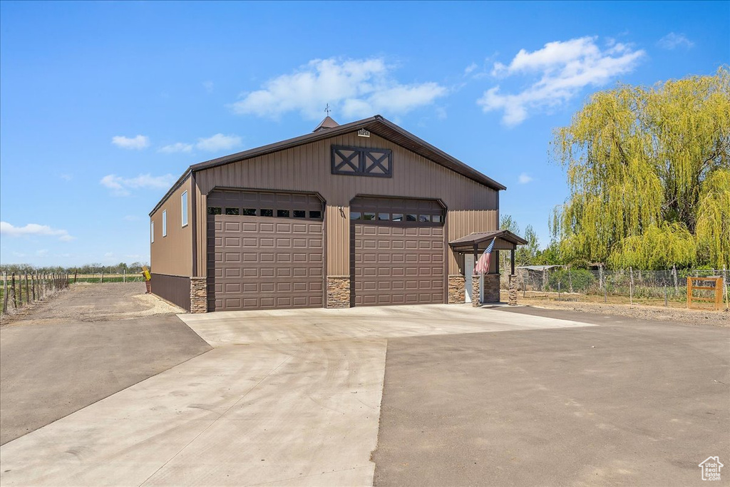 Detached garage with fence
