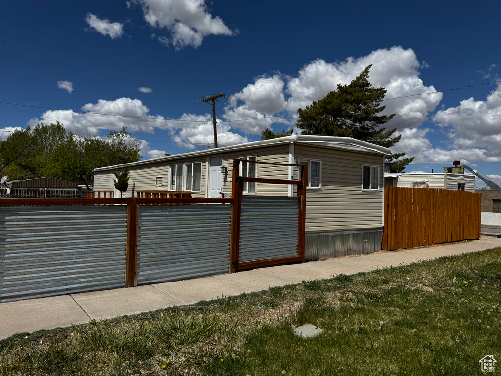 View of gate featuring fence private yard