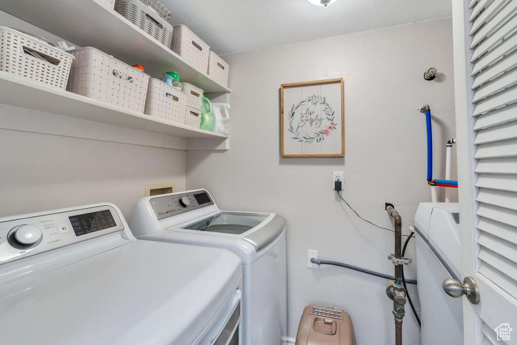 Clothes washing area with laundry area and washer and dryer