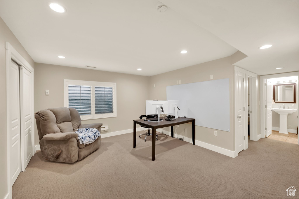 Home office with carpet floors, baseboards, recessed lighting, and visible vents