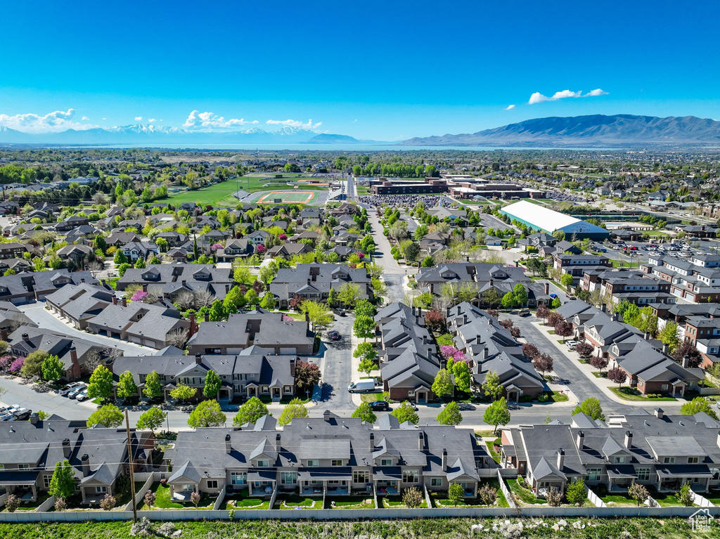 Drone / aerial view with a mountain view and a residential view