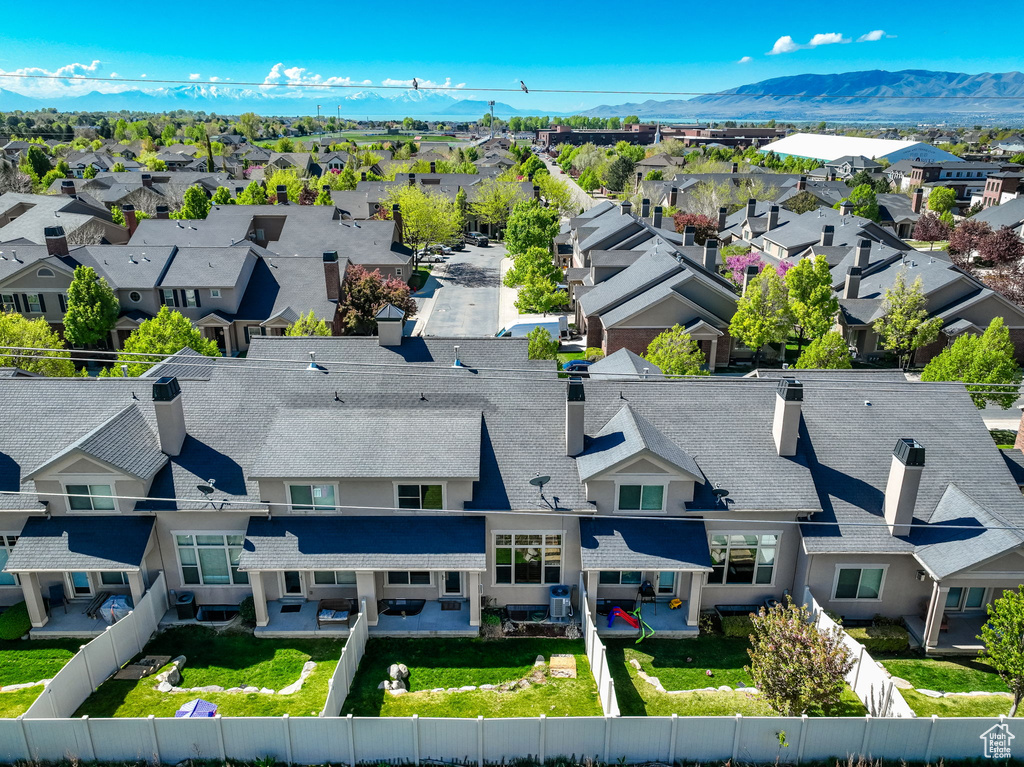 Drone / aerial view with a residential view and a mountain view