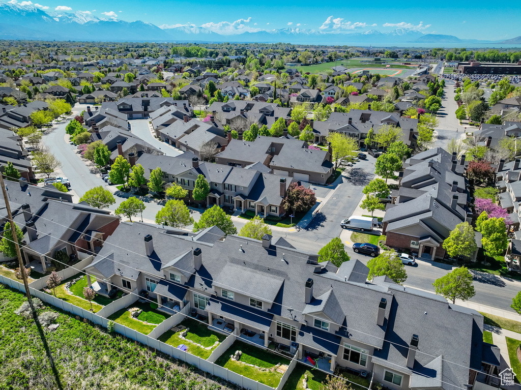 Birds eye view of property featuring a residential view and a mountain view