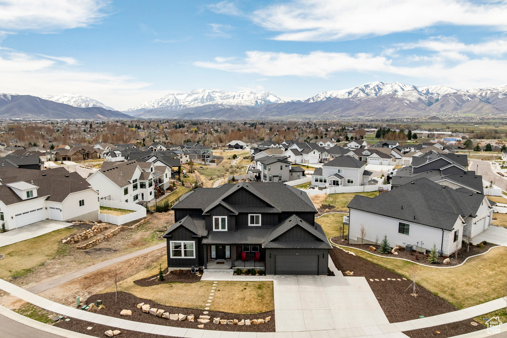 Aerial view featuring a residential view and a mountain view