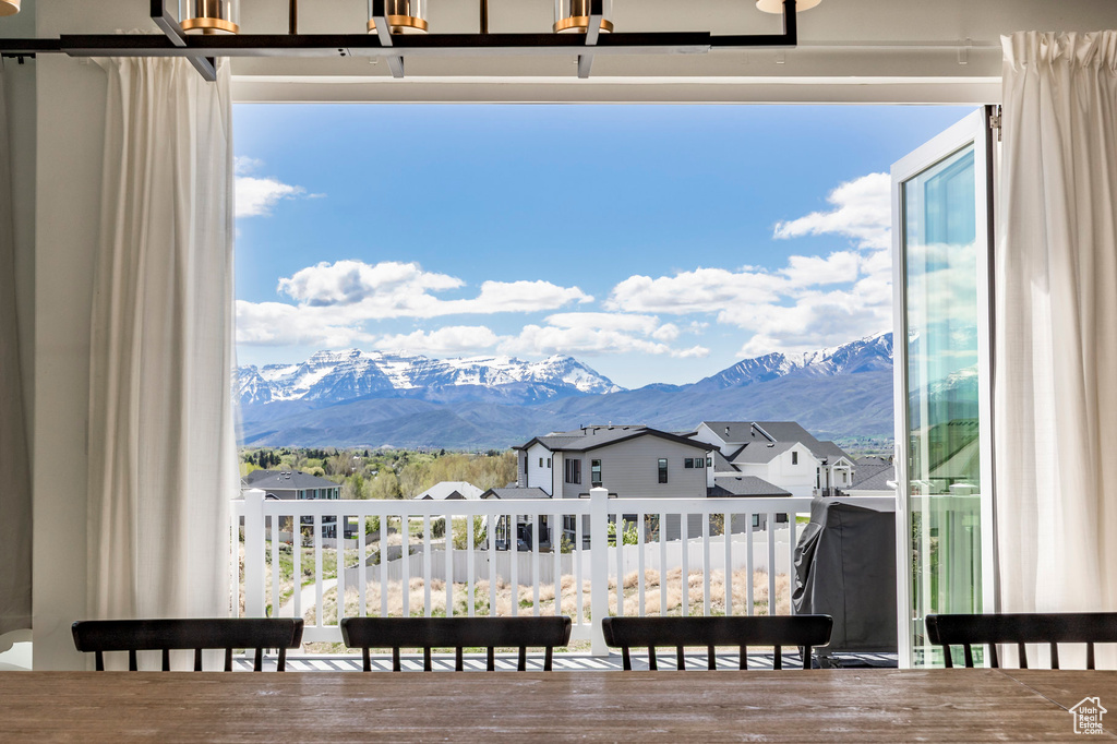 Dining space featuring a mountain view and a residential view
