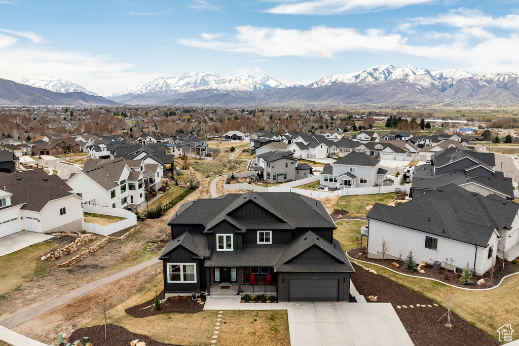 Aerial view featuring a residential view and a mountain view