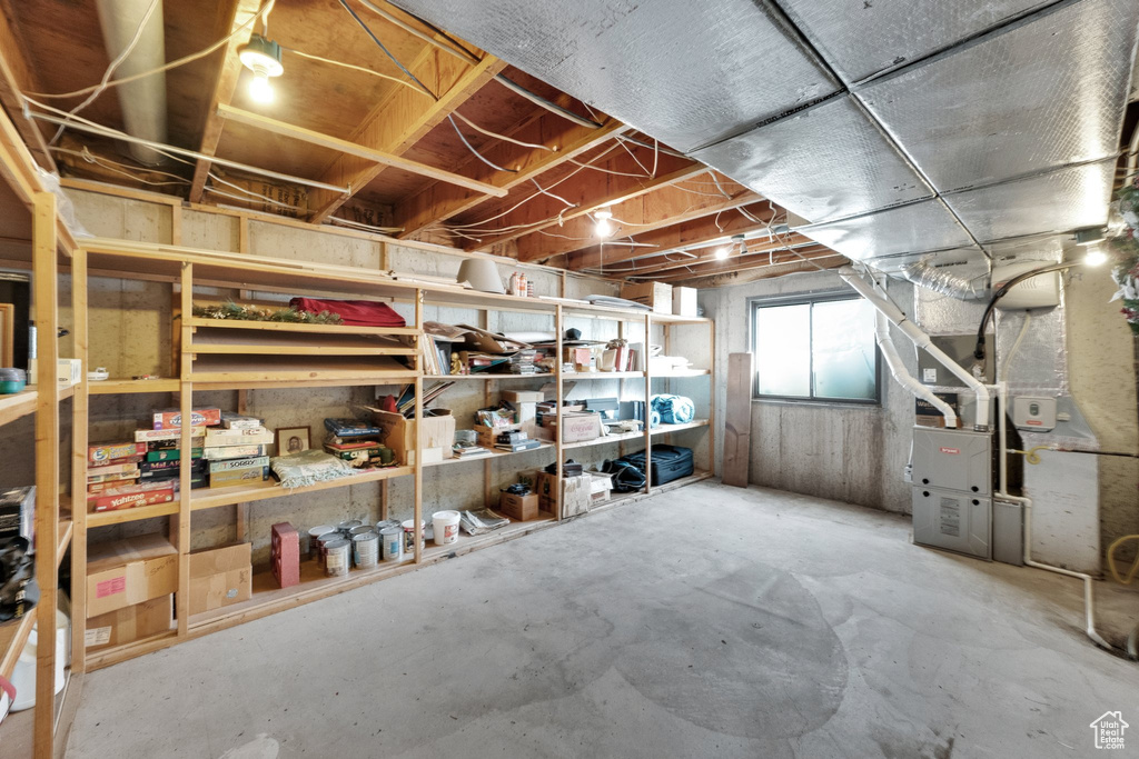 Below grade area featuring heating unit