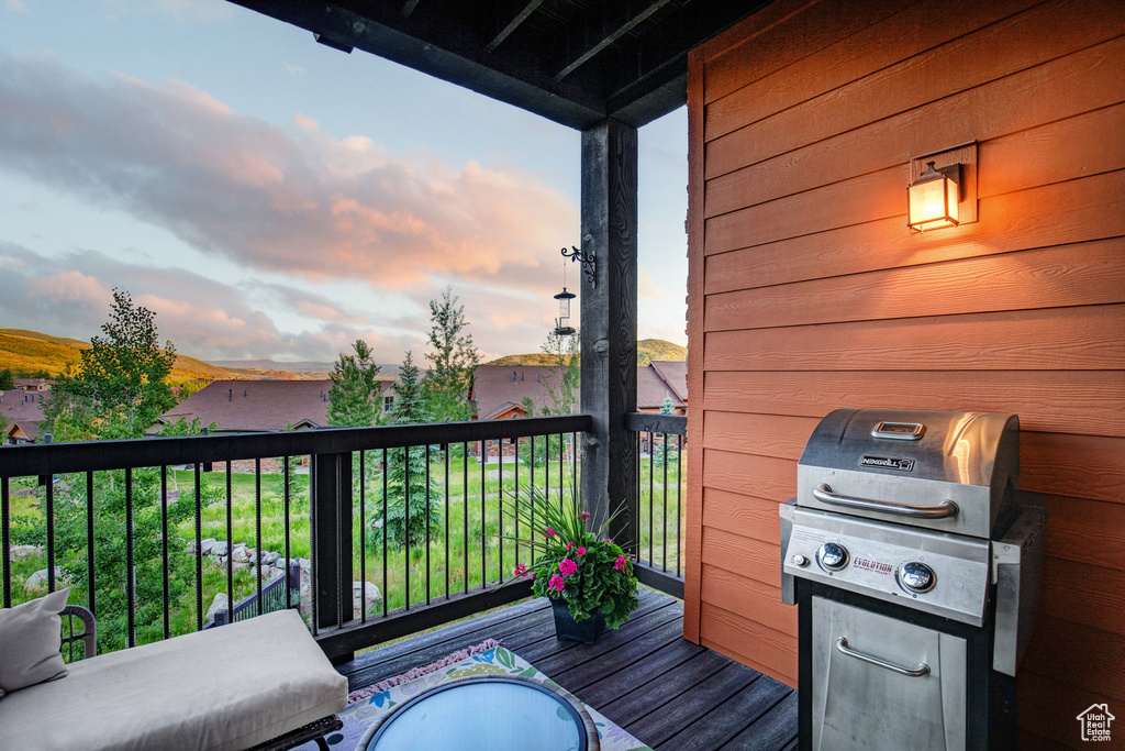 Wooden deck with a grill