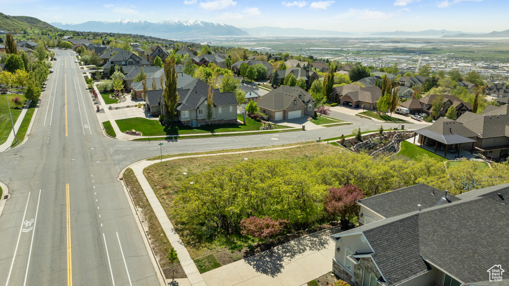 Birds eye view of property featuring a residential view and a mountain view