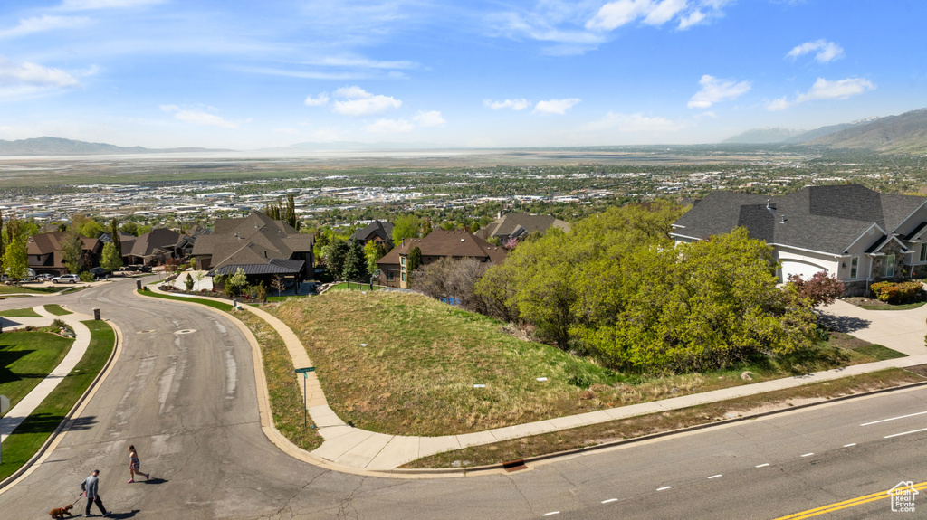 Aerial view featuring a mountain view and a residential view