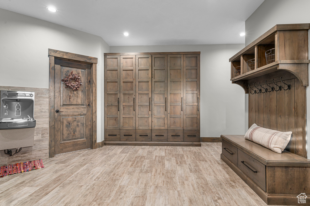 Mudroom with light wood-type flooring, baseboards, and recessed lighting