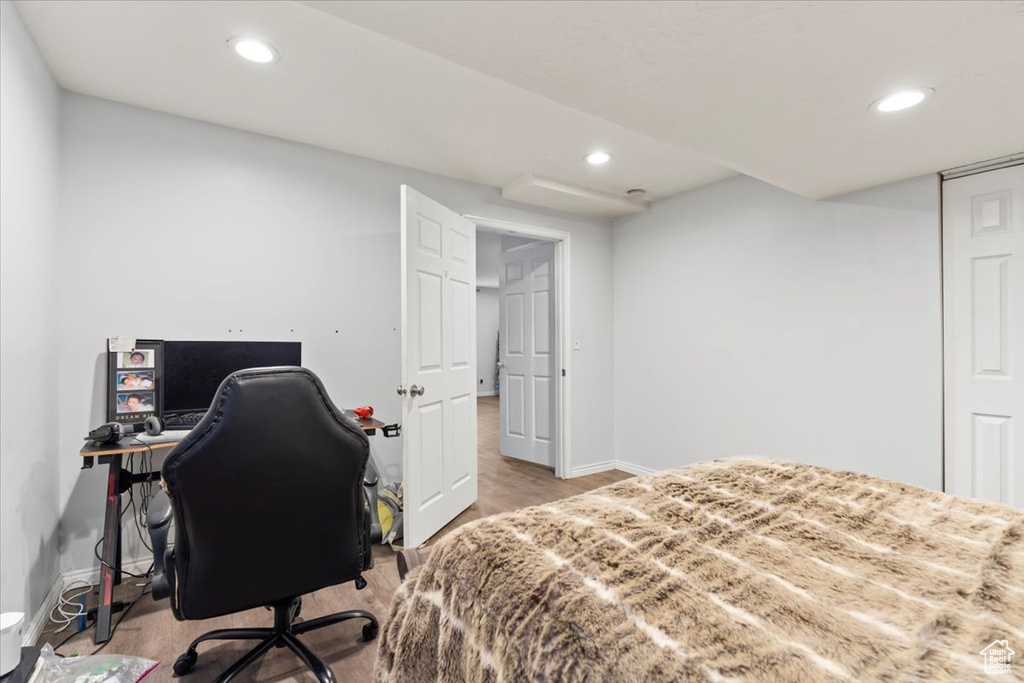 Bedroom featuring recessed lighting, light wood-style flooring, and baseboards