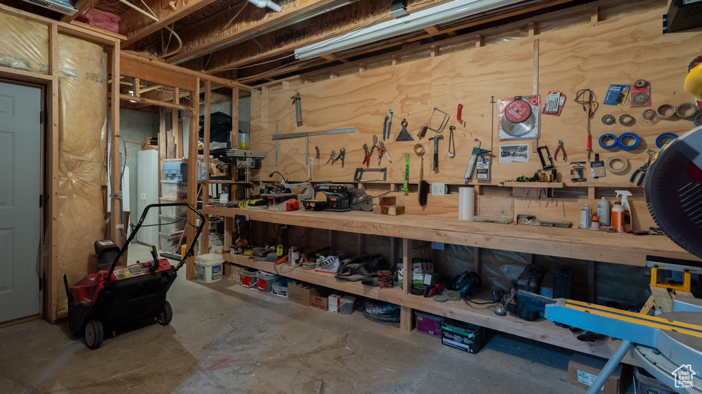 Basement featuring a workshop area