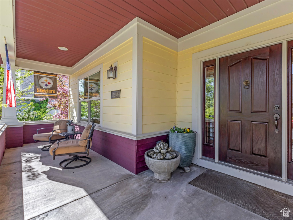 Doorway to property with a porch