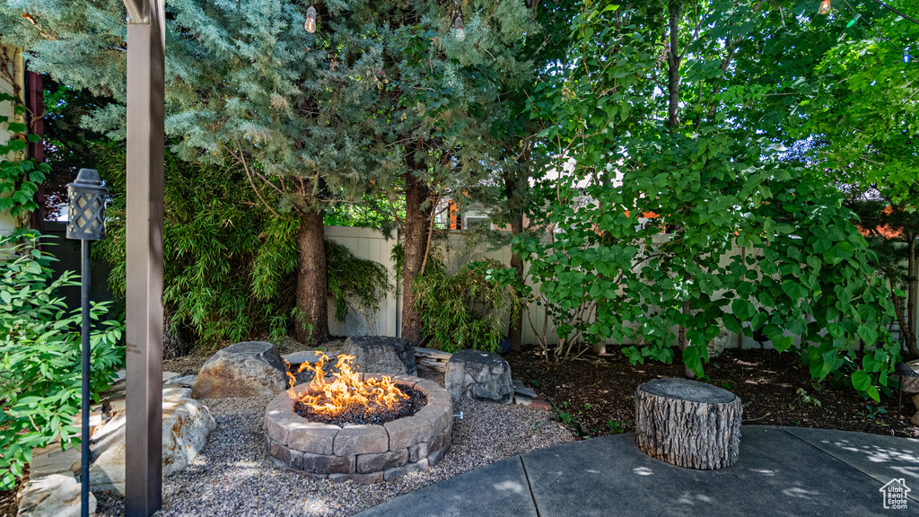 View of patio / terrace featuring an outdoor fire pit