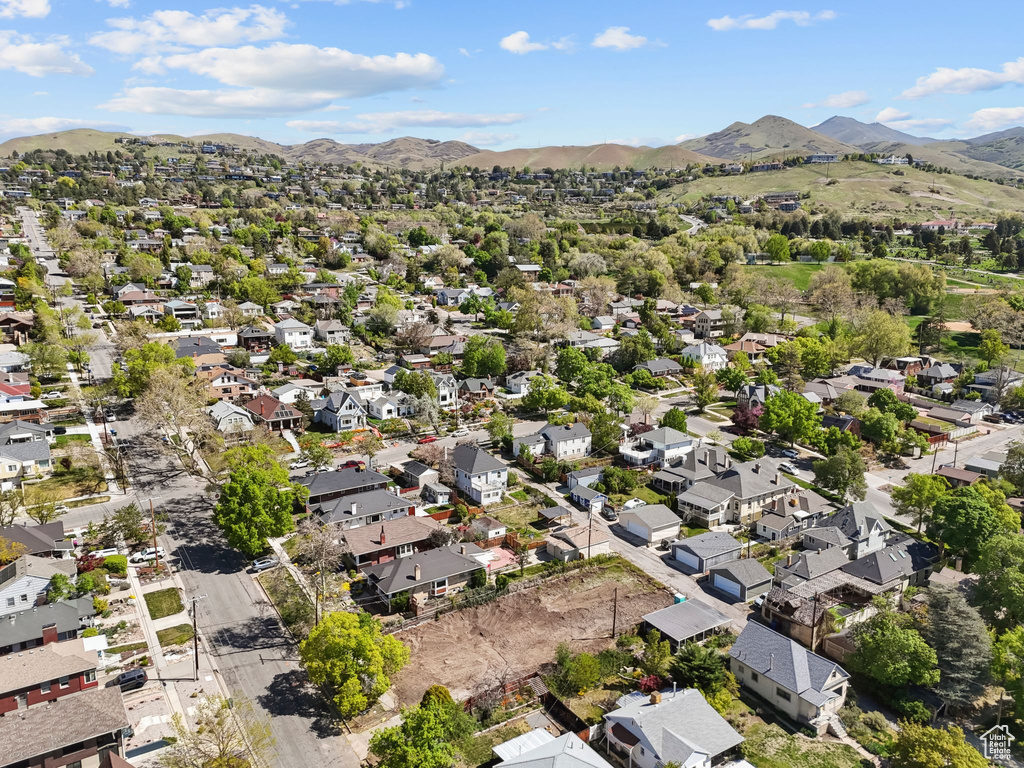 Drone / aerial view with a mountain view and a residential view