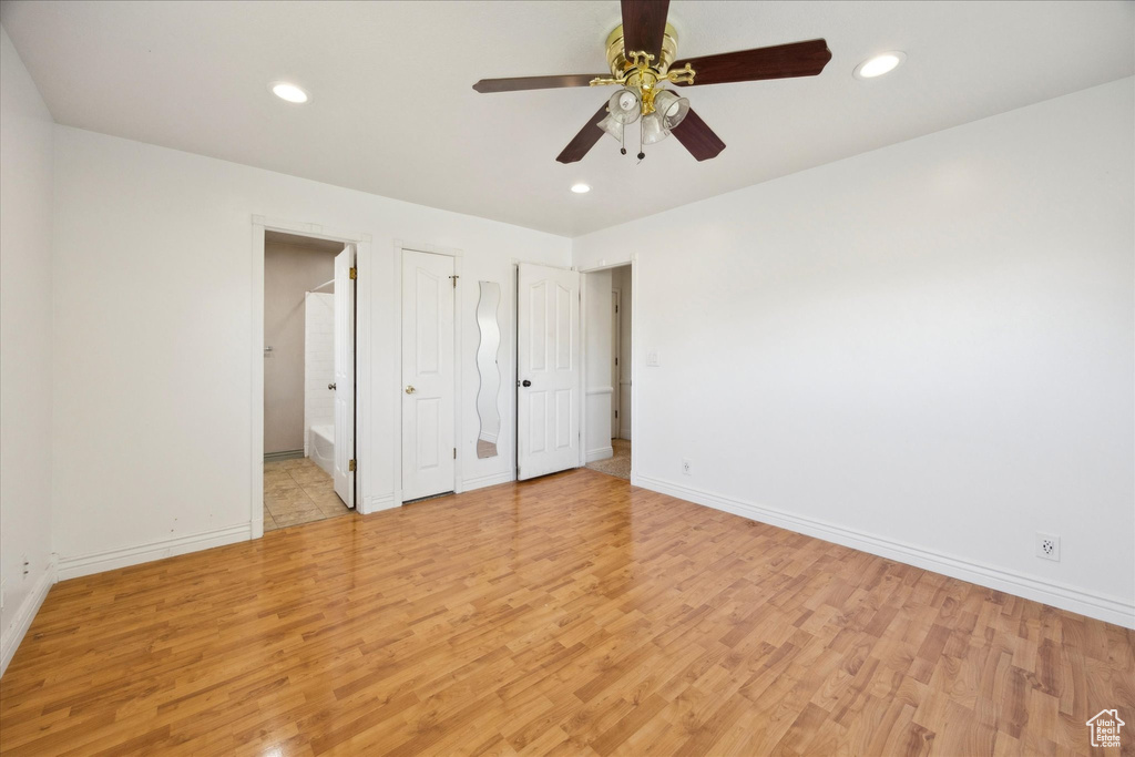 Unfurnished bedroom featuring baseboards, recessed lighting, and light wood-style flooring