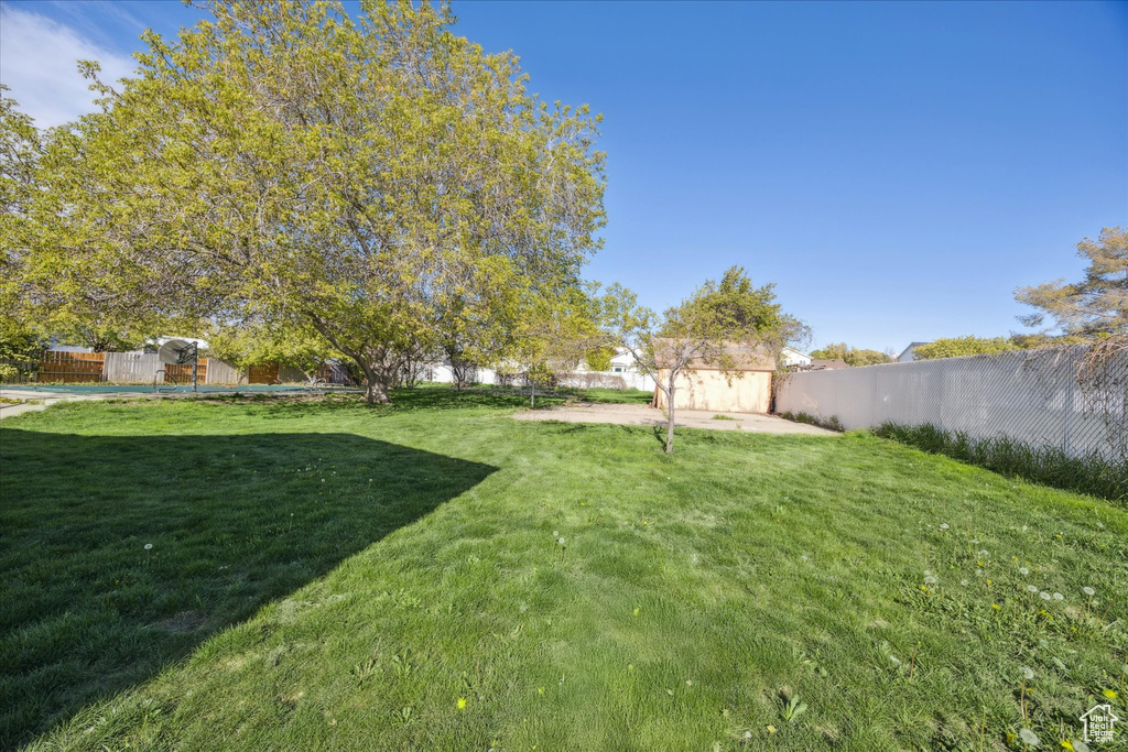 View of yard featuring a fenced backyard