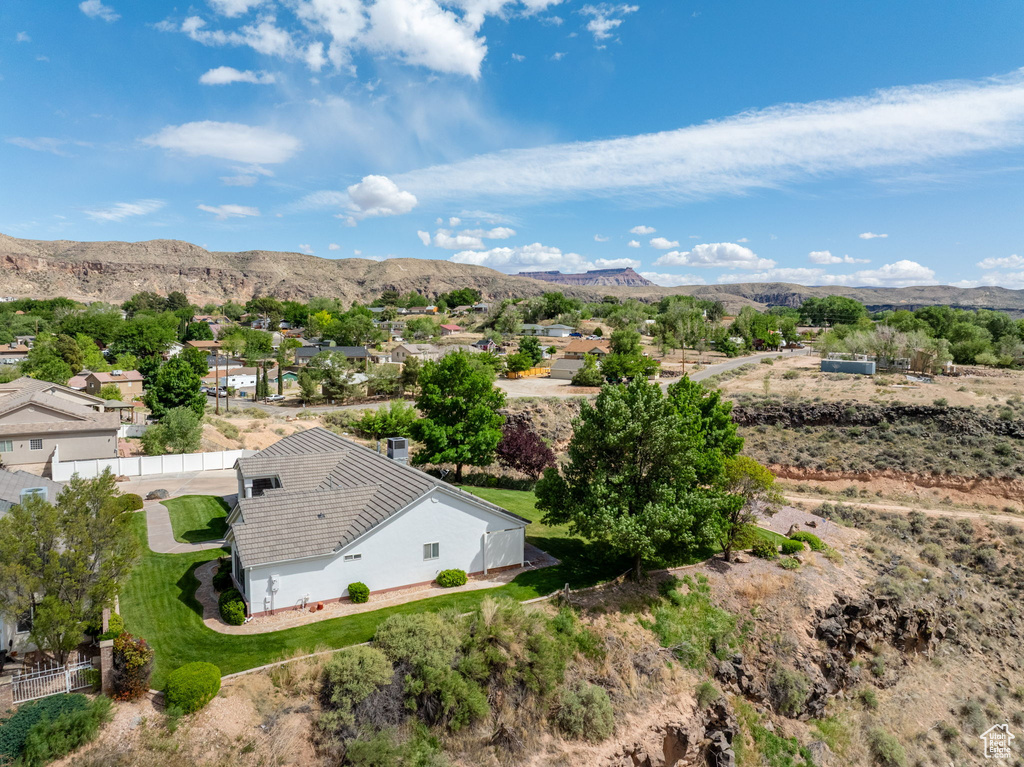 Birds eye view of property featuring a mountain view and a residential view