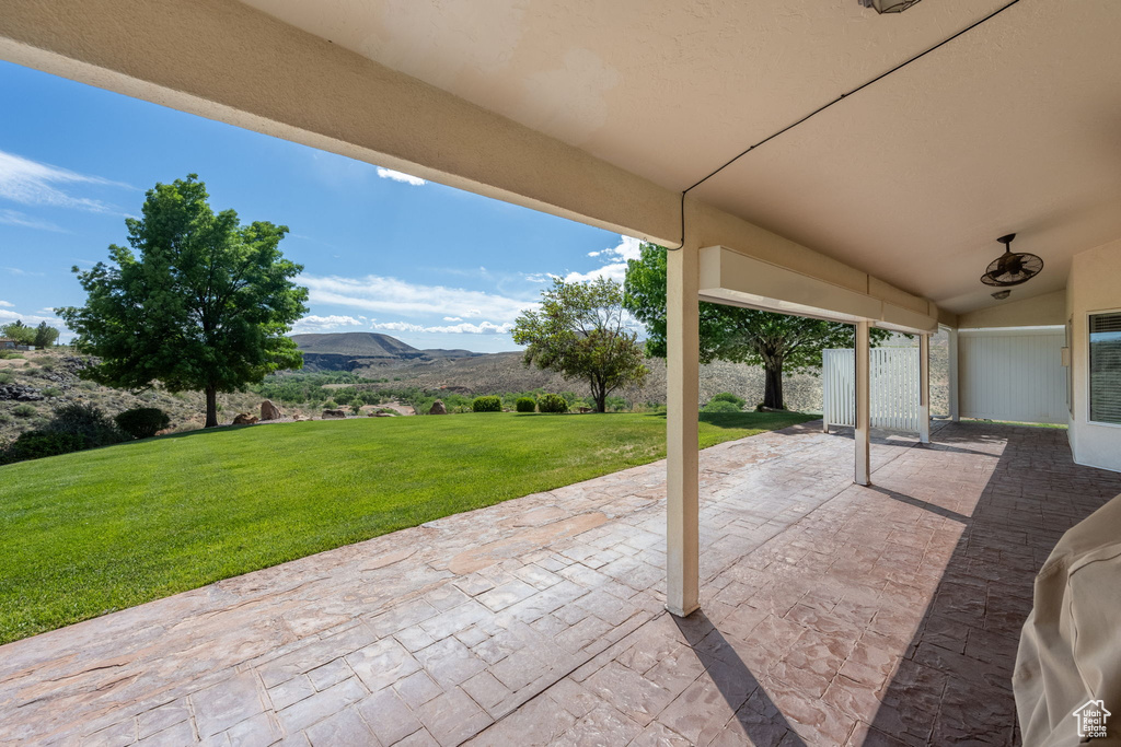 View of patio / terrace with a mountain view