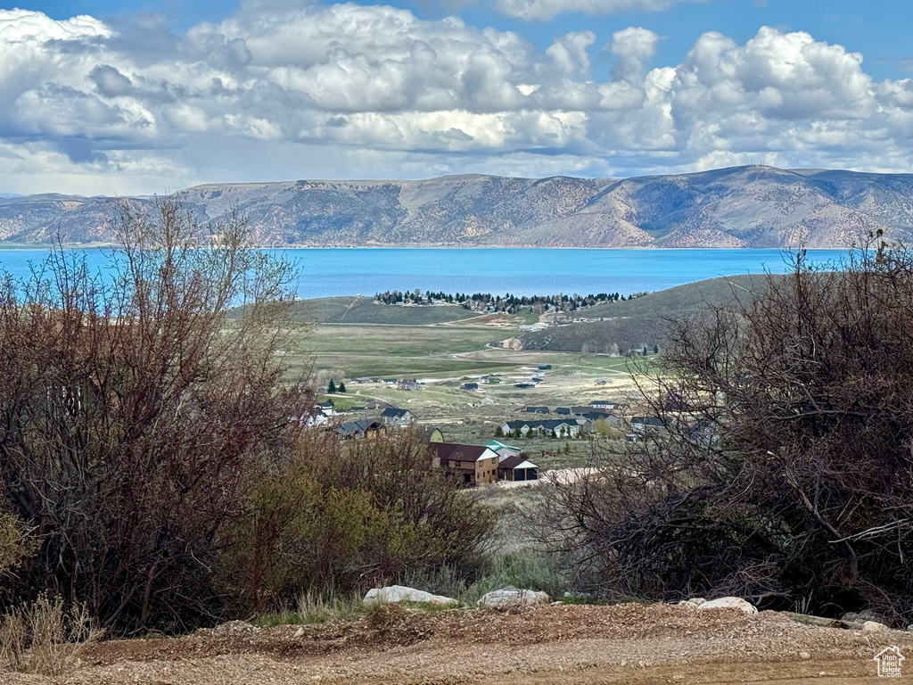 View of water feature with a mountain view