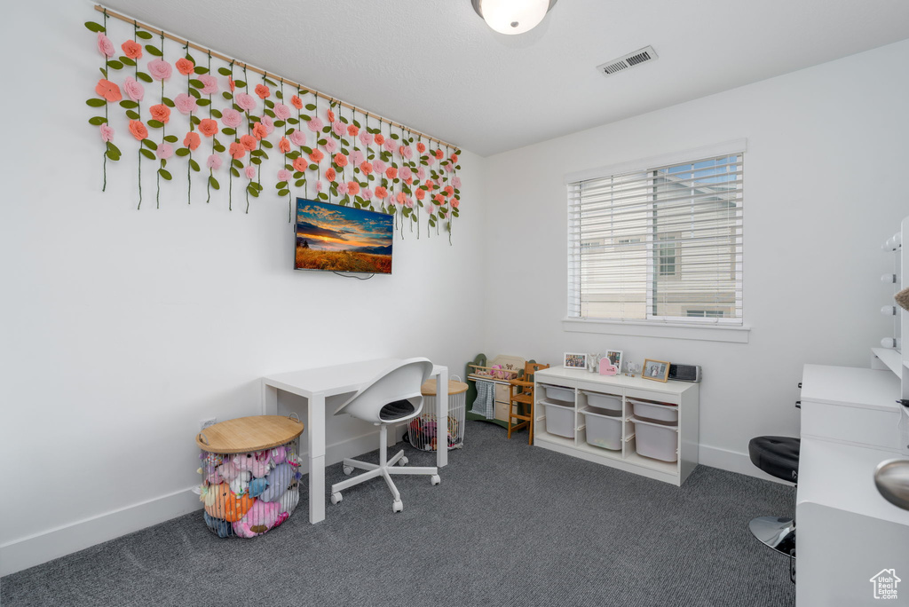 Game room featuring visible vents, carpet flooring, and baseboards