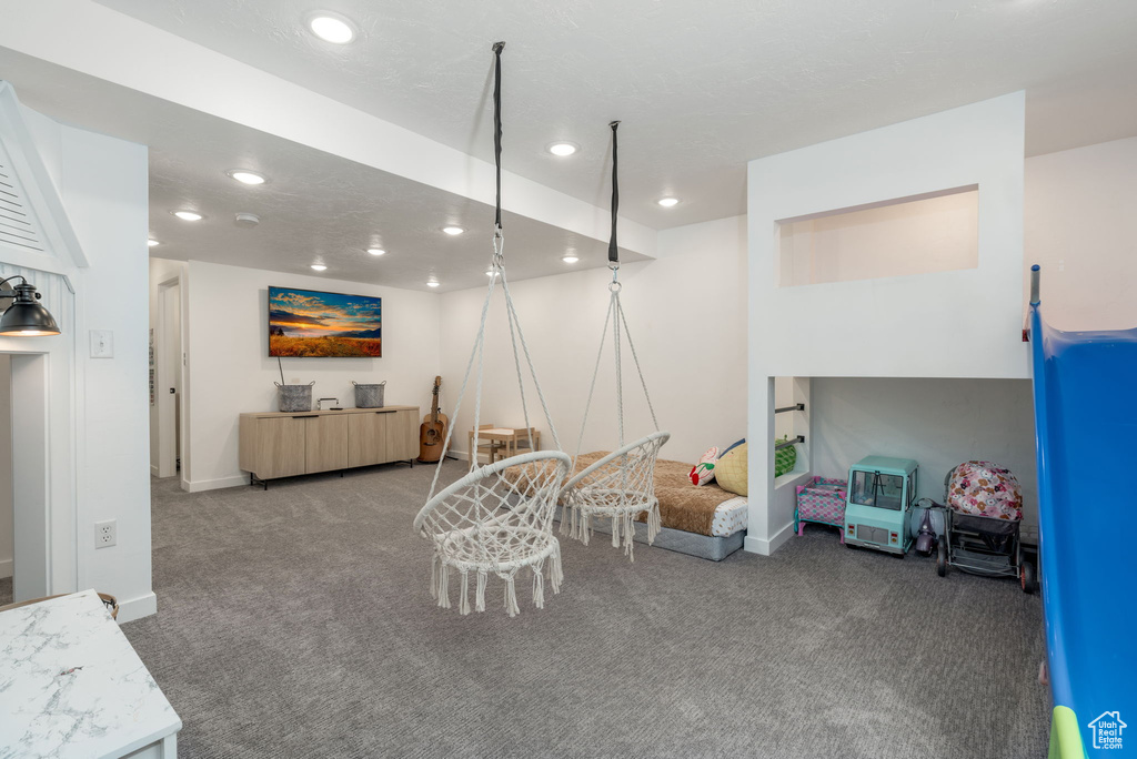 Rec room featuring recessed lighting, carpet, and baseboards
