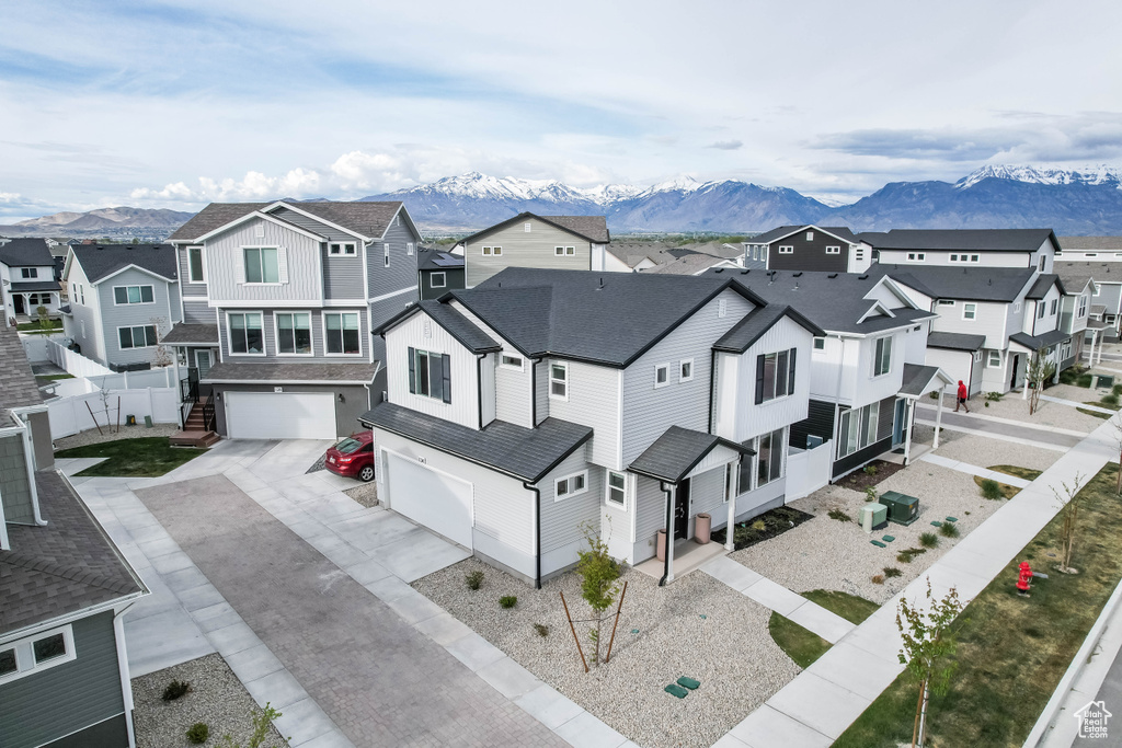 Drone / aerial view featuring a residential view and a mountain view