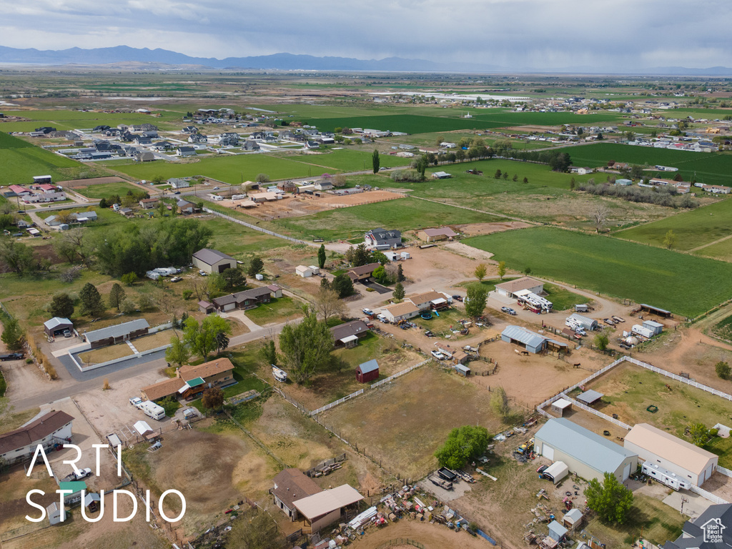 Birds eye view of property featuring a mountain view and a rural view