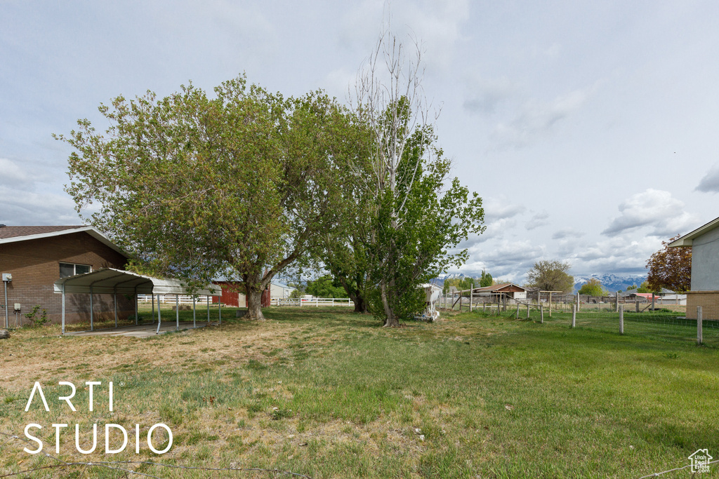 View of yard with fence