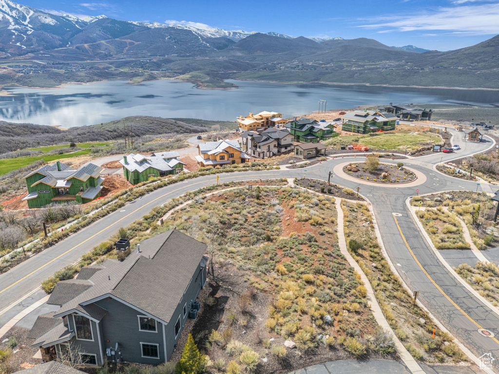 Aerial view with a residential view and a water and mountain view