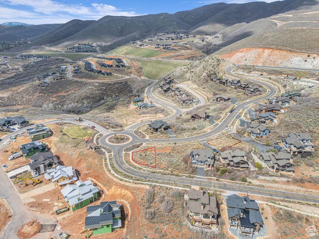 Property view of mountains with a residential view