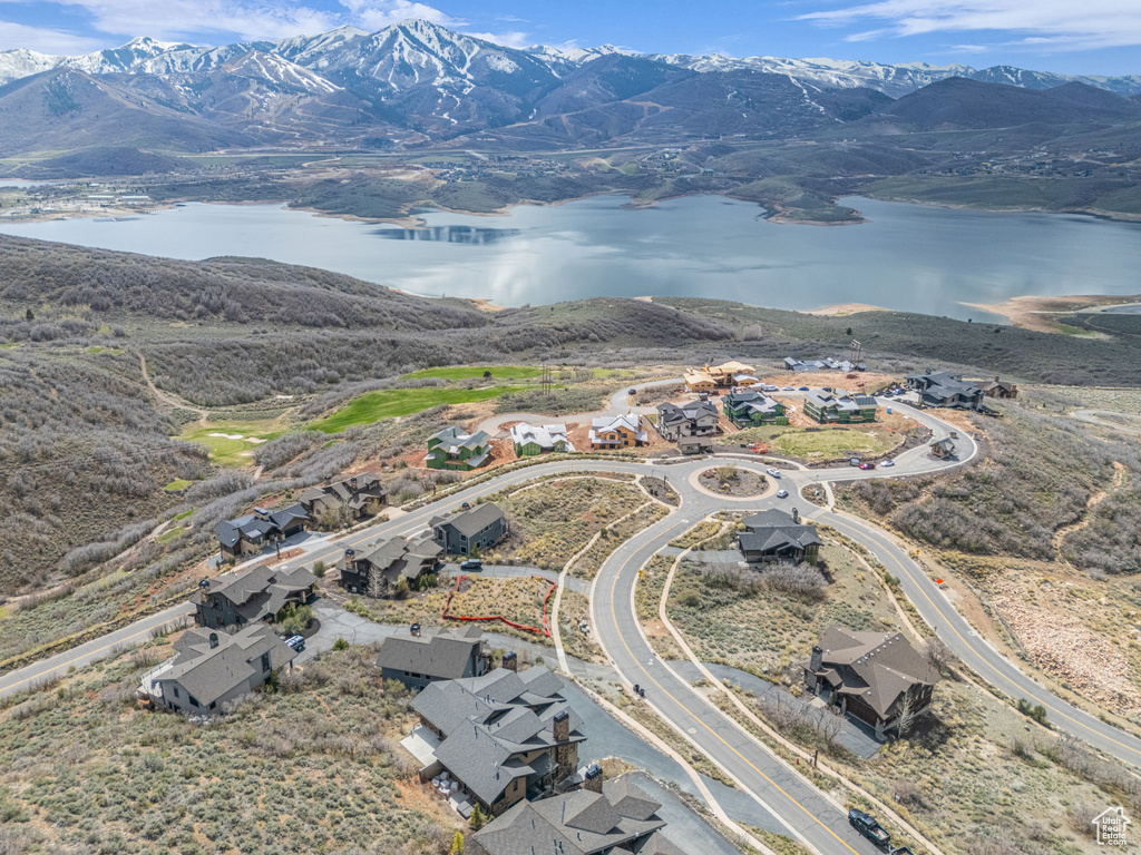 Aerial view featuring a residential view and a water and mountain view