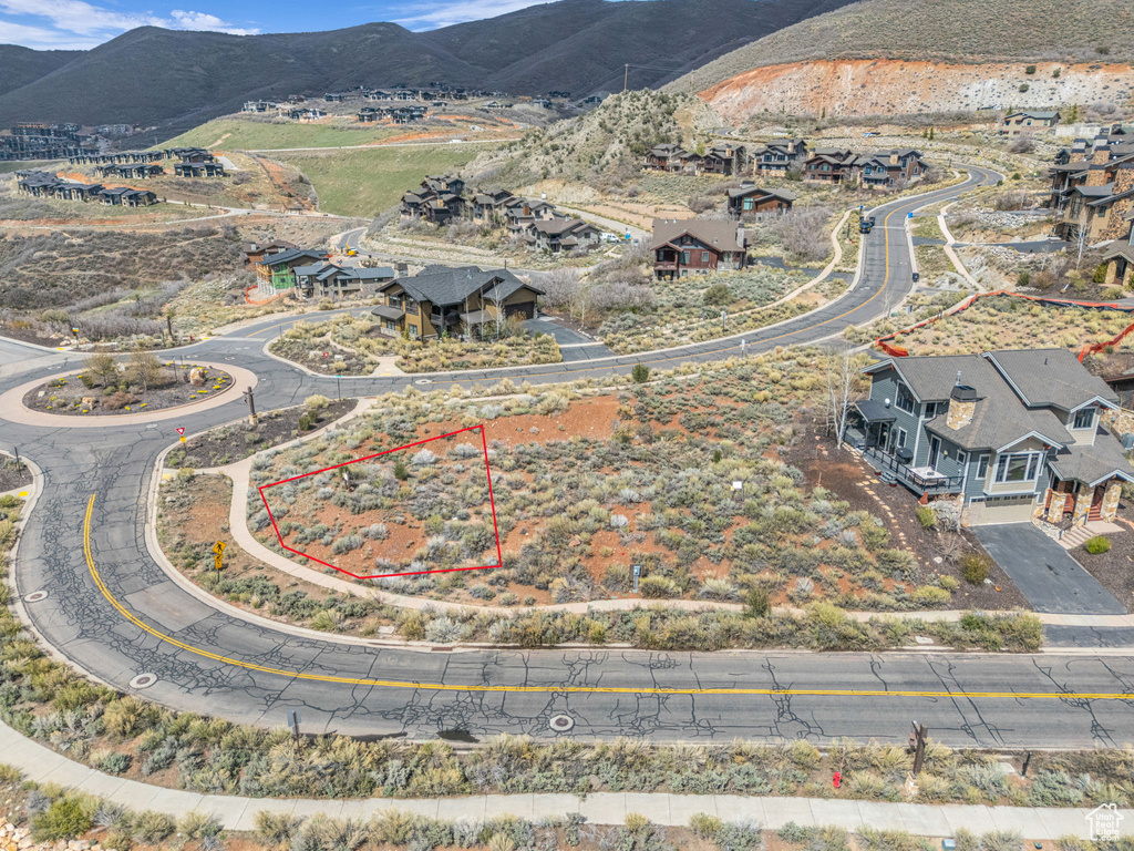 Birds eye view of property featuring a mountain view