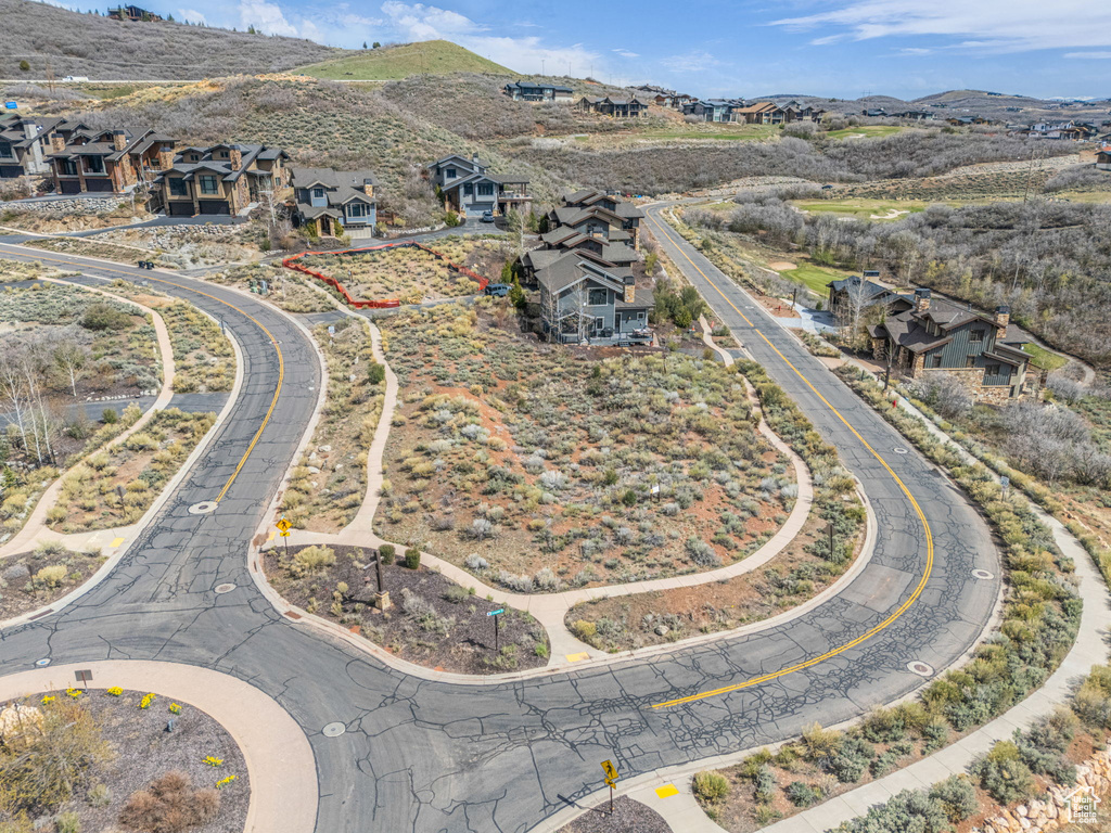 Birds eye view of property featuring a residential view and a mountain view