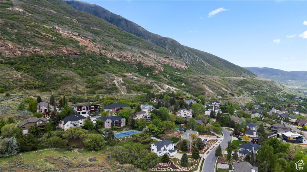 Aerial view featuring a mountain view and a residential view