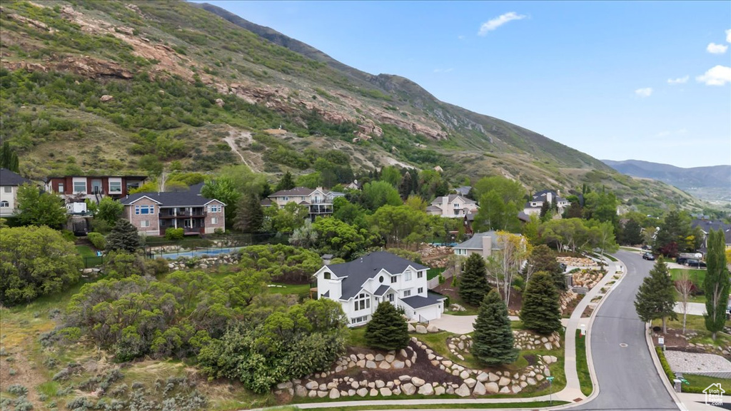 Drone / aerial view with a mountain view and a residential view
