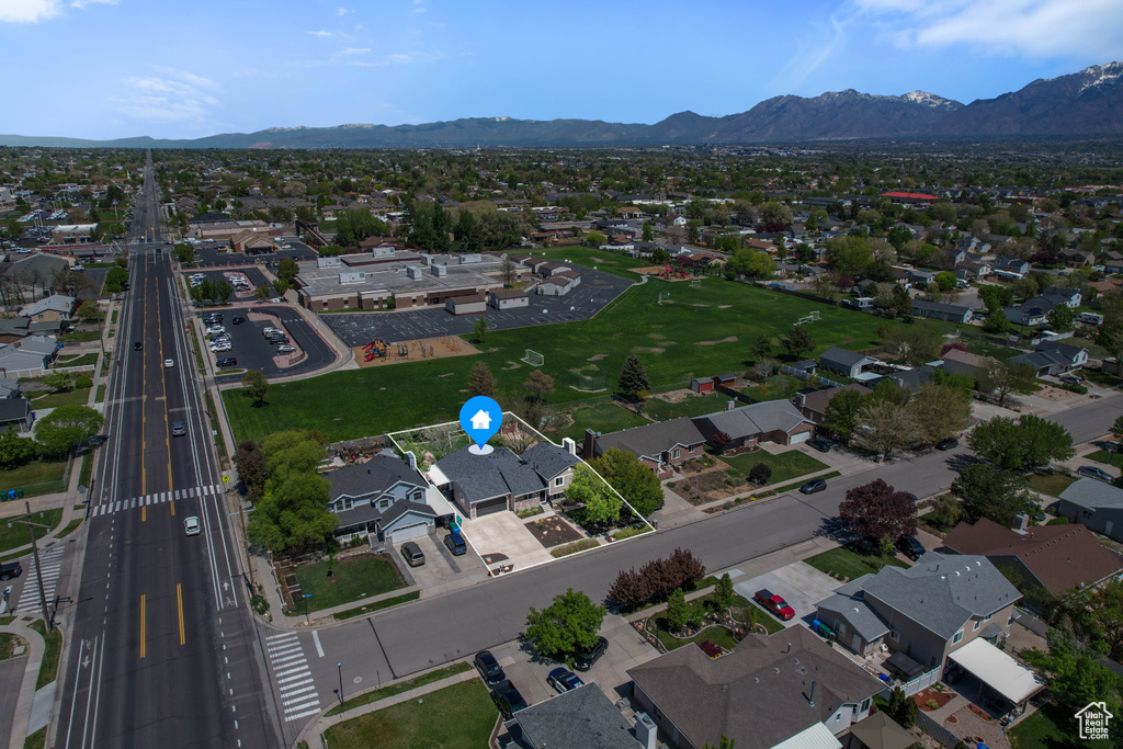 Aerial view featuring a residential view and a mountain view