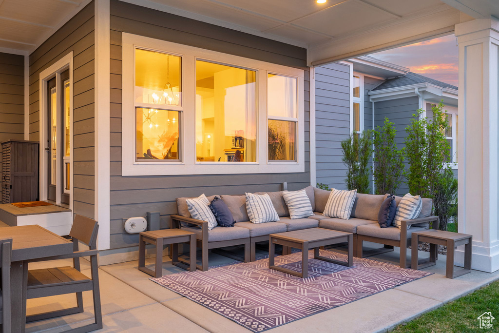 View of patio with an outdoor living space