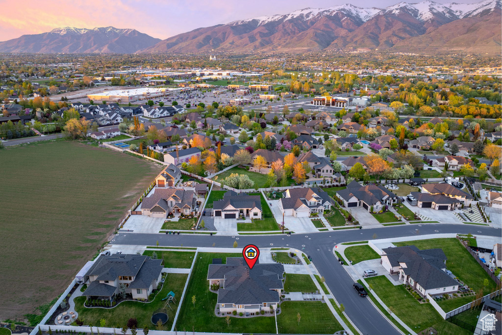 Aerial view at dusk with a mountain view and a residential view