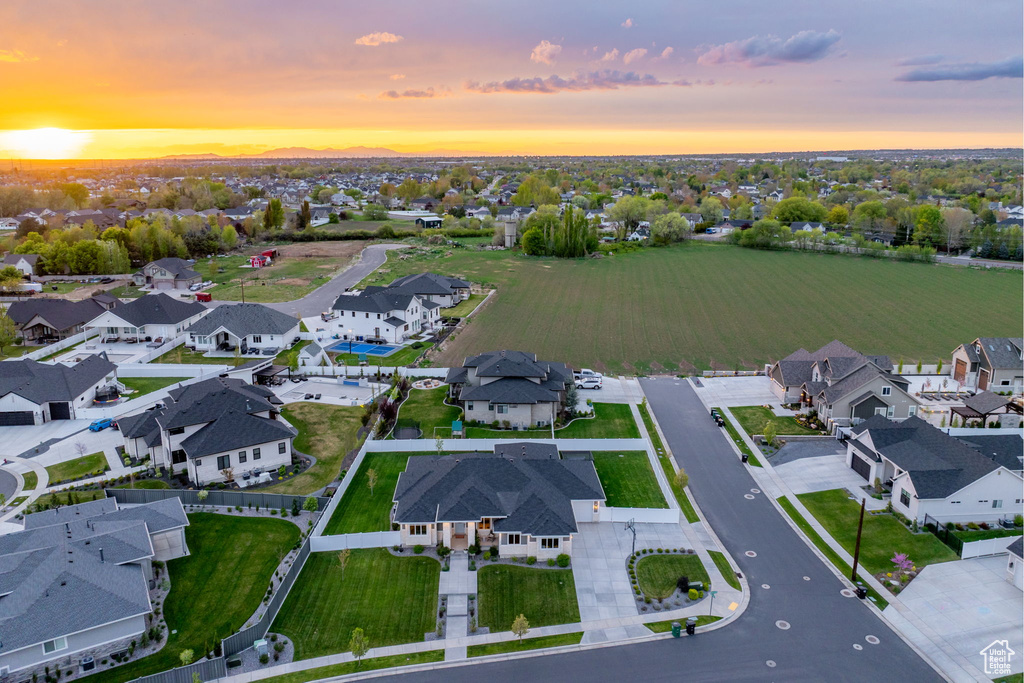 Aerial view at dusk with a residential view