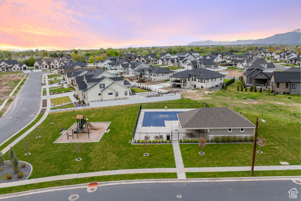 Aerial view at dusk with a mountain view and a residential view