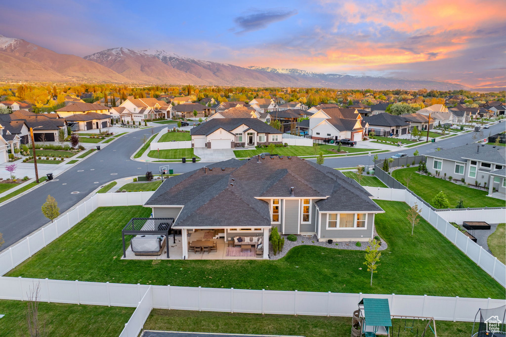 Drone / aerial view with a mountain view and a residential view