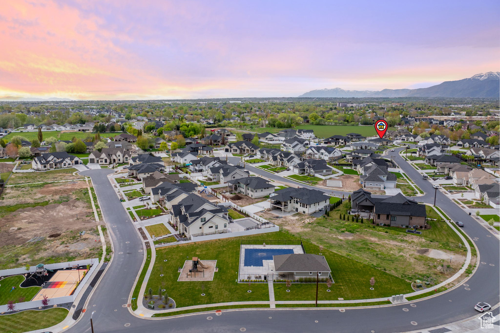 Drone / aerial view with a mountain view and a residential view