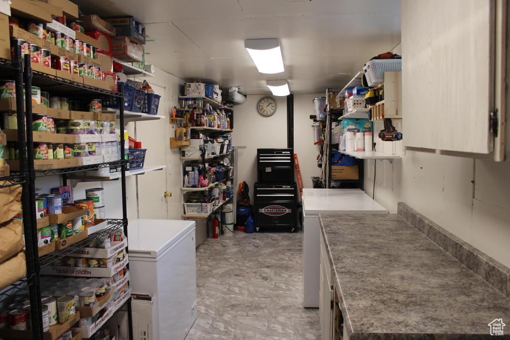 Below grade area with fridge
