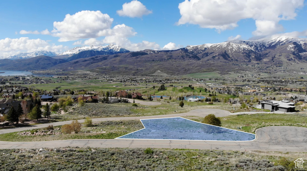 Mountain view featuring a water view